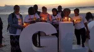 Some of the youth with candles lighting the way.